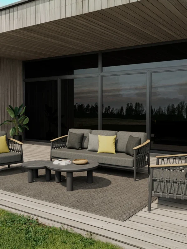 Modern outdoor sofa set with chairs and tables on a wooden deck.