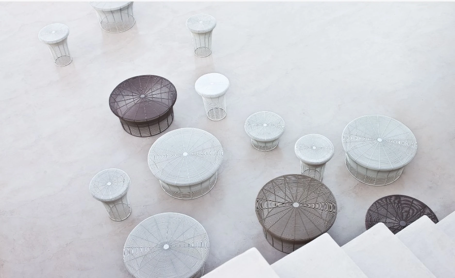 Outdoor wire side and coffee tables in multiple sizes for hospitality spaces